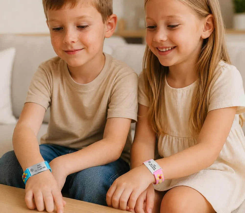 Two kids wearing medical ID bracelets